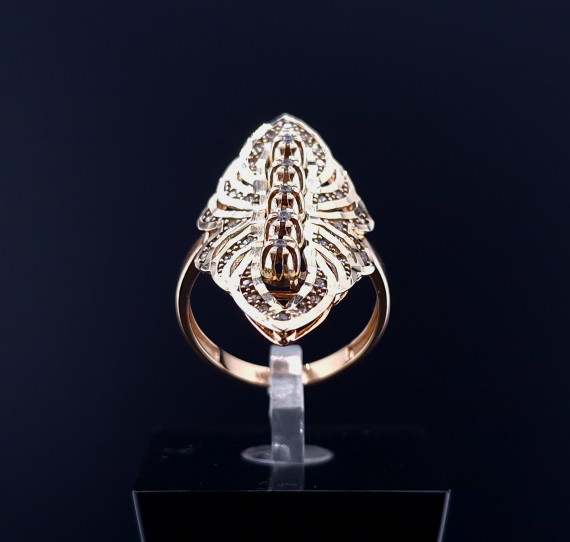Gold ring with zircons