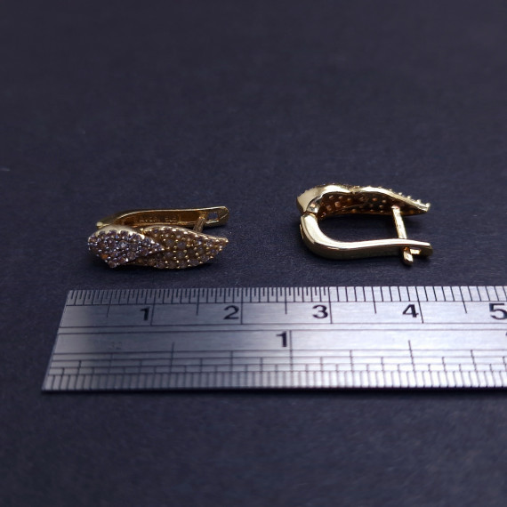 Gold earrings with zircons 