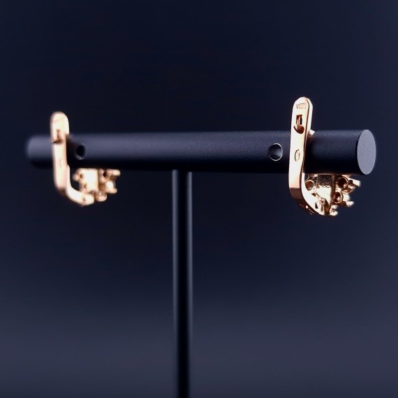 Gold earrings with zircons 