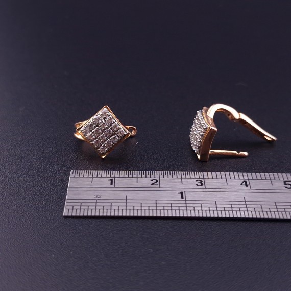 Gold earrings with zircons 