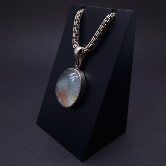 Silver pendant with colored stone