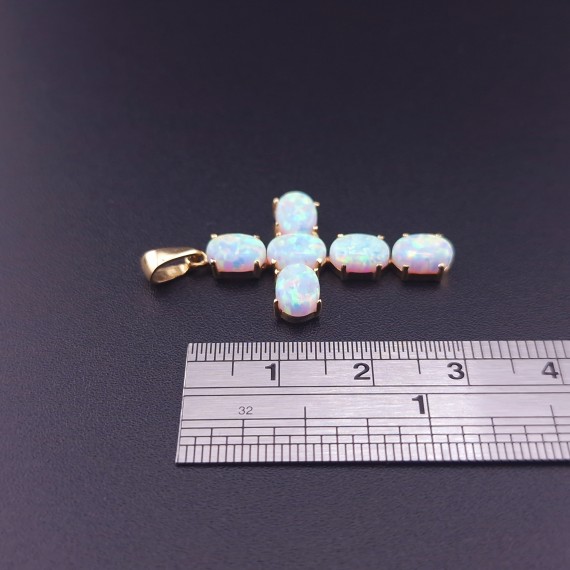 Gold cross with opals