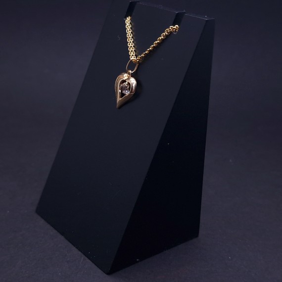 Gold pendant with zircon