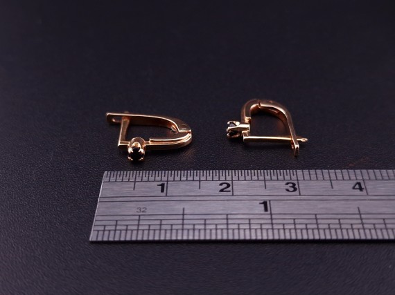Gold earrings with colored stones
