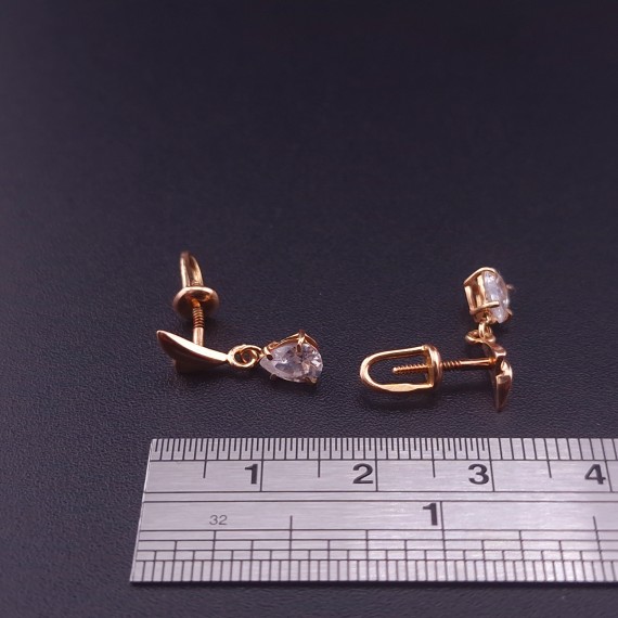 Gold earrings with zircons 