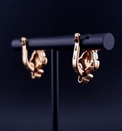 Gold earrings with zircons 