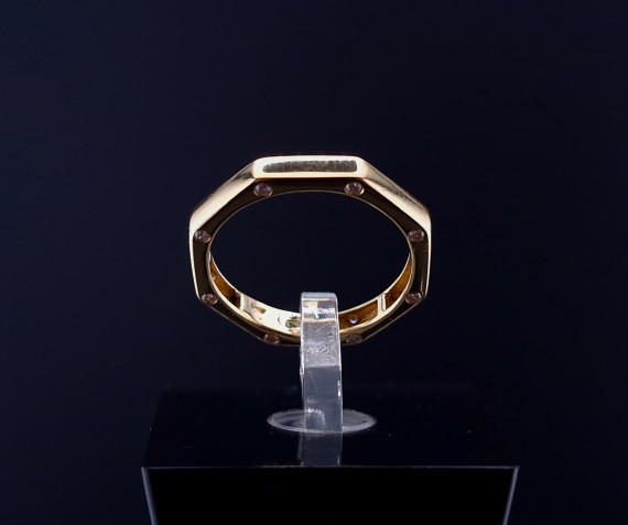 Gold ring with zircons