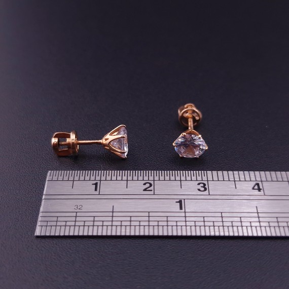 Gold earrings with zircons 