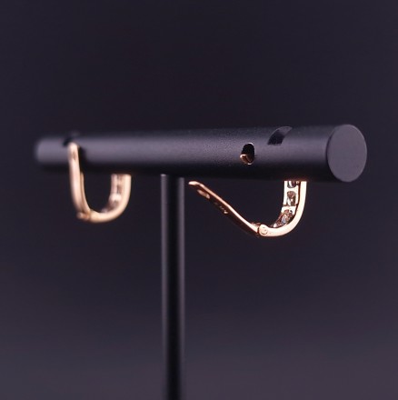 Gold earrings with zircons 