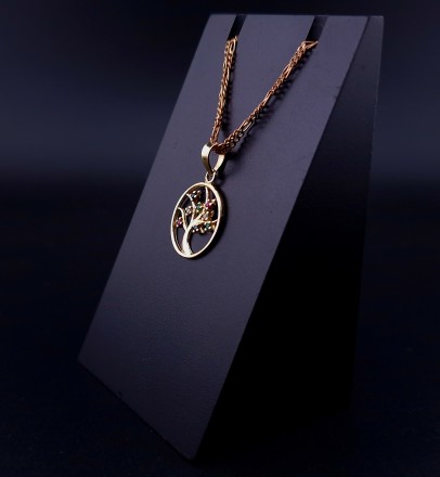 Gold pendant with colored stones
