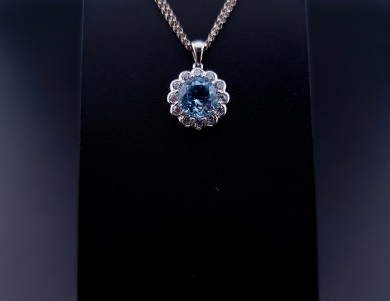 Gold pendant with colored stones