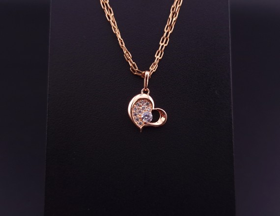 Gold pendant with zircons