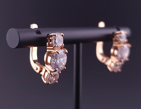 Gold earrings with zircons 