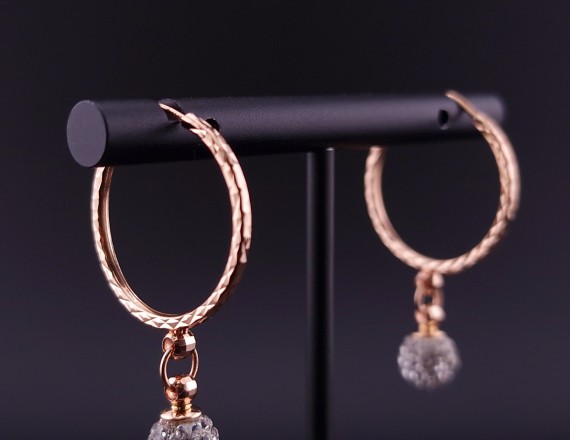 Gold earrings with zircons 