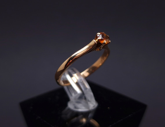 Gold ring with orange topaz