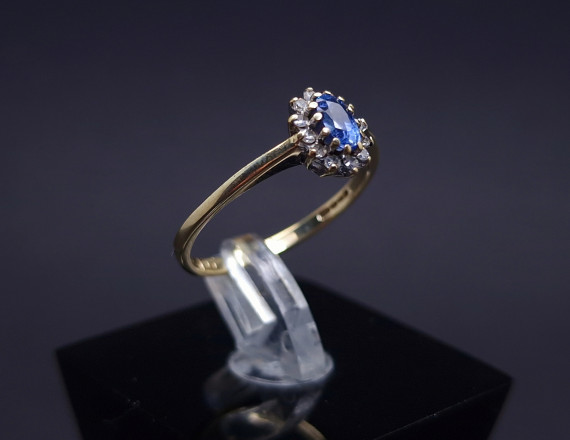 Gold ring with diamonds and stone