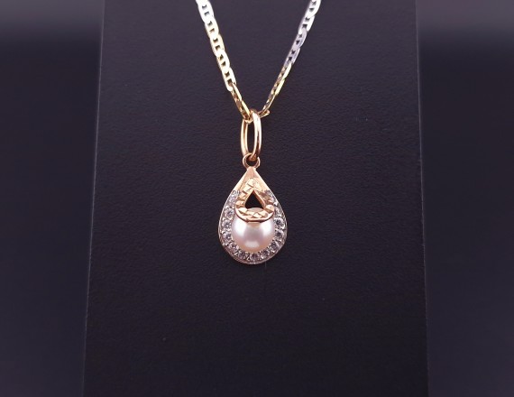 Gold pendant with pearls and zircons