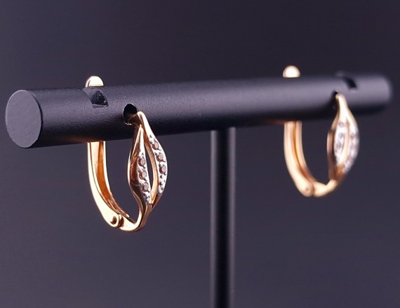 Gold earrings with zircons 