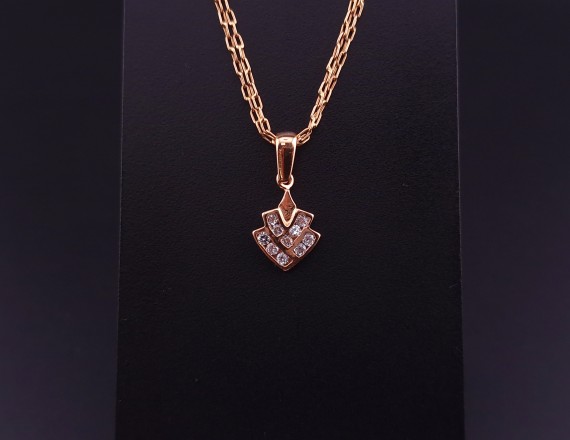 Gold pendant with zircons