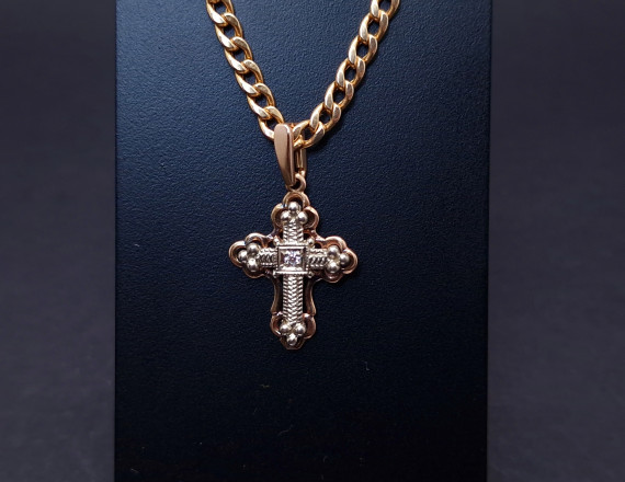 Gold cross with diamond