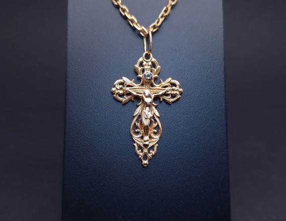 Gold cross with diamond