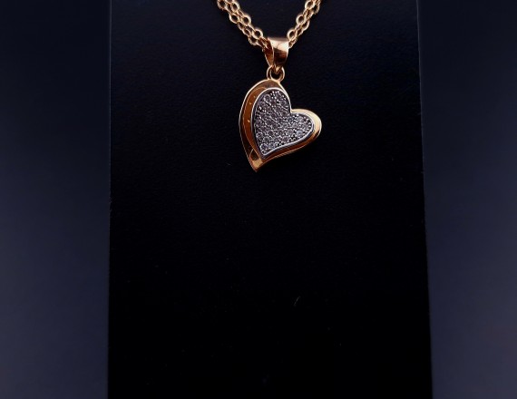 Gold pendant with zircons