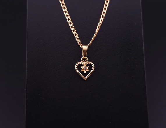 Gold pendant with zircon
