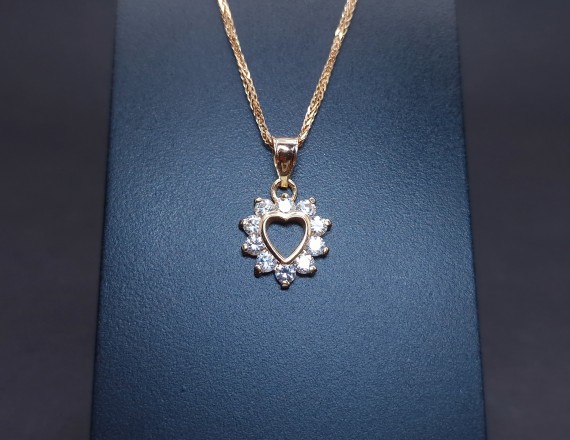 Gold pendant with zircons