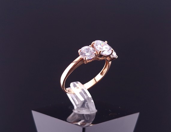 Gold ring with zircons