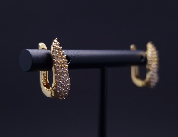 Gold earrings with zircons 