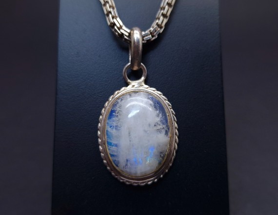 Silver pendant with colored stone