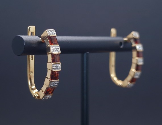 Gold earrings with diamonds and colored stones