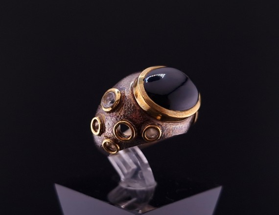 Silver ring with colored stones