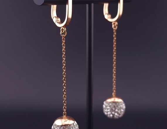 Gold earrings with zircons 