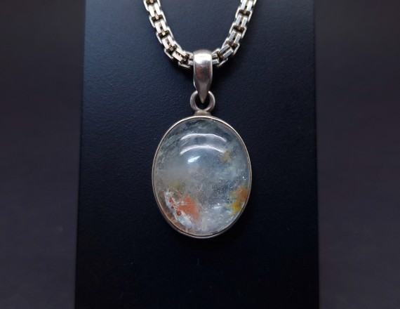 Silver pendant with colored stone