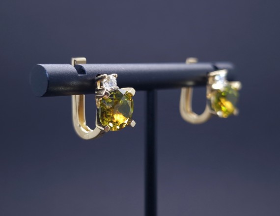 Gold earrings with diamonds and colored stones