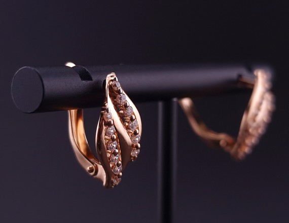 Gold earrings with zircons 