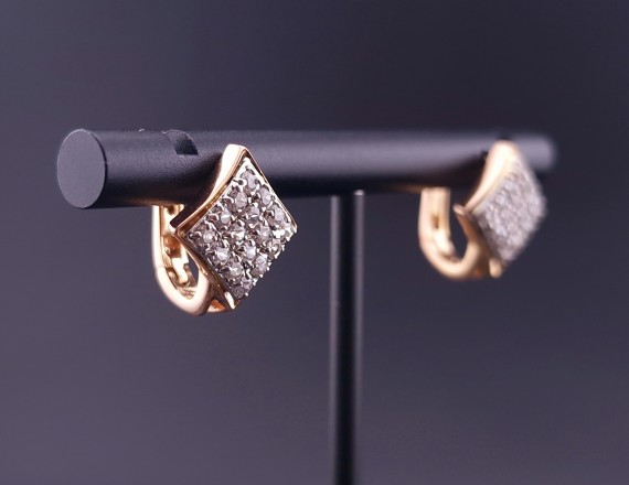 Gold earrings with zircons 