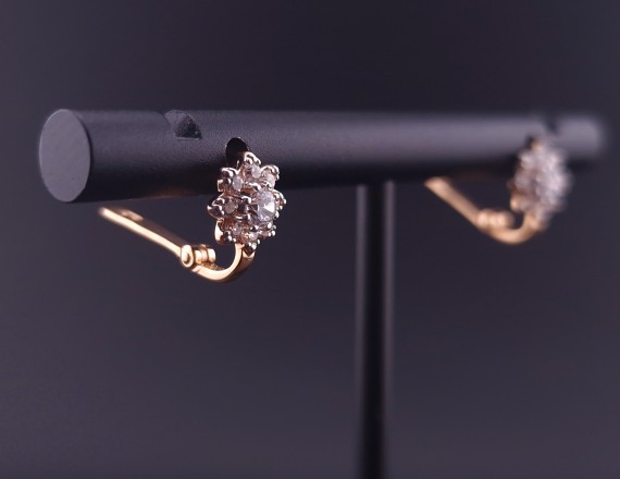 Gold earrings with zircons 