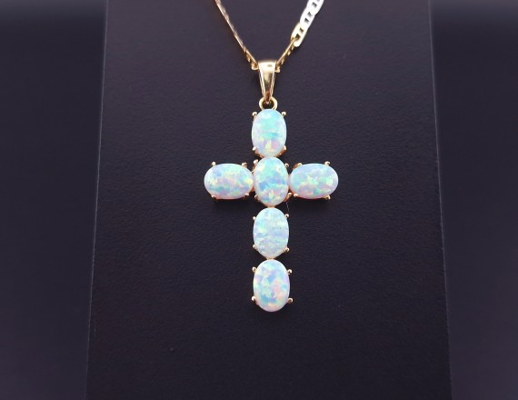 Gold cross with opals